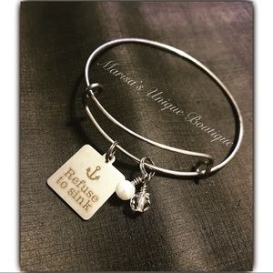 Refuse to sink bangle